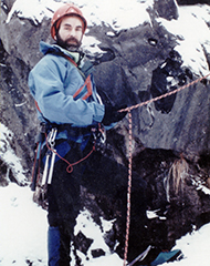 Photograph of Dan Fox ice climbing.